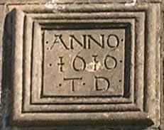 Datestone commemorating the work of Thomas Daunt II in 1616 