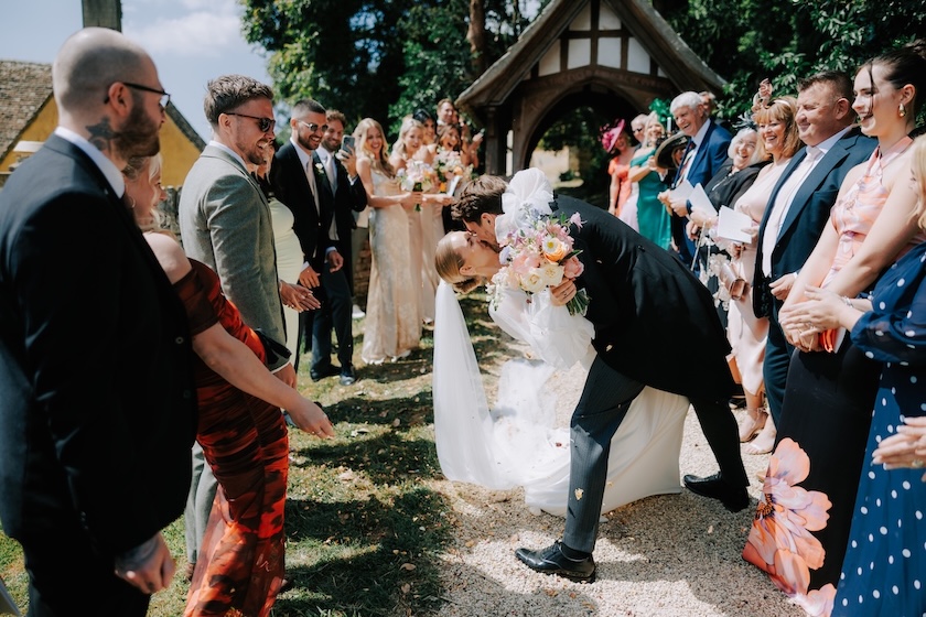 Confetti throw Owlpen Manor church wedding